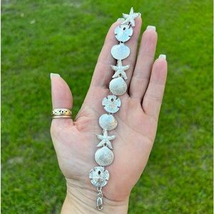 Vintage Sterling Silver Starfish and Shells Nautical
Ocean Seashells Bracelet